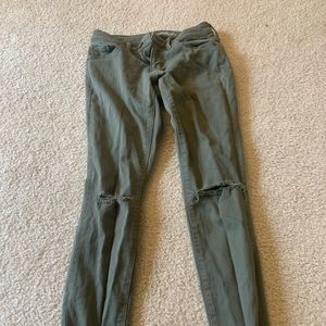 Green ripped jeans